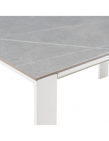 Mesa extensible JANET 140 (190-240) x 90. Porcelánico gris y base de metal blanco.