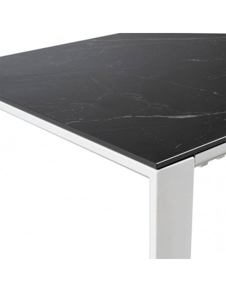 Mesa extensible JANET 140 (190-240) x 90. Porcelánico negro y base de metal blanco.